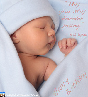 New born baby wrapped in blanket with happy birthday quote.