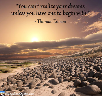 Sunrise on stoney beach with Thomas Edison quote about dreams.