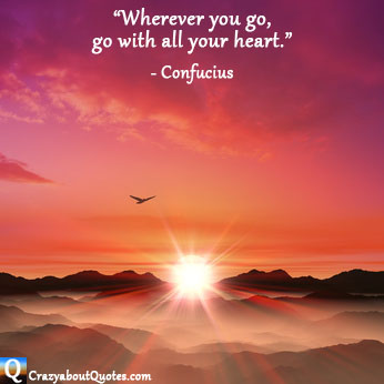 Warm glowing sunset over misty mountains with Confucius quote.