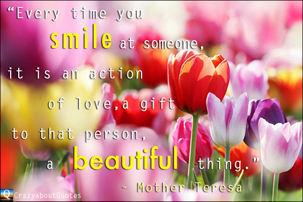 Beautiful red and purple tulips with quote about love from Mother Teresa.