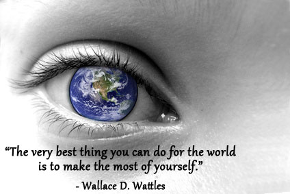 The world in the pupil of an eye with Wallace Wattles quote.